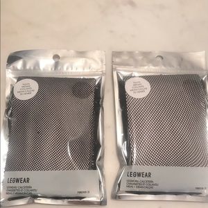 Black fishnet tights never opened. 2 pairs